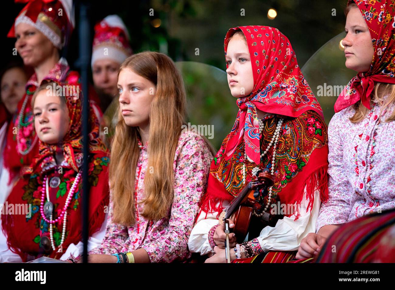 Local girls in traditional estonian folk costumes on Jaanipaeva ...