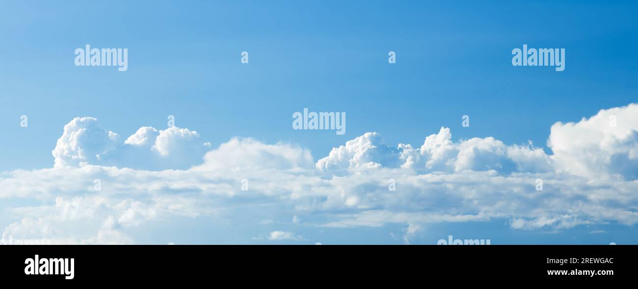 Sky clouds panorama. Blue sky and white clouds background, banner Stock Photo