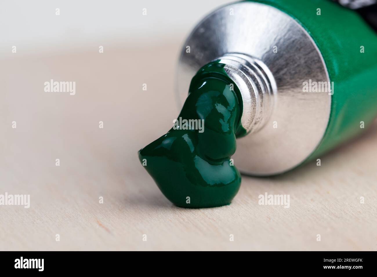 tubes of green oil paint for painting pictures, oil paints for creative