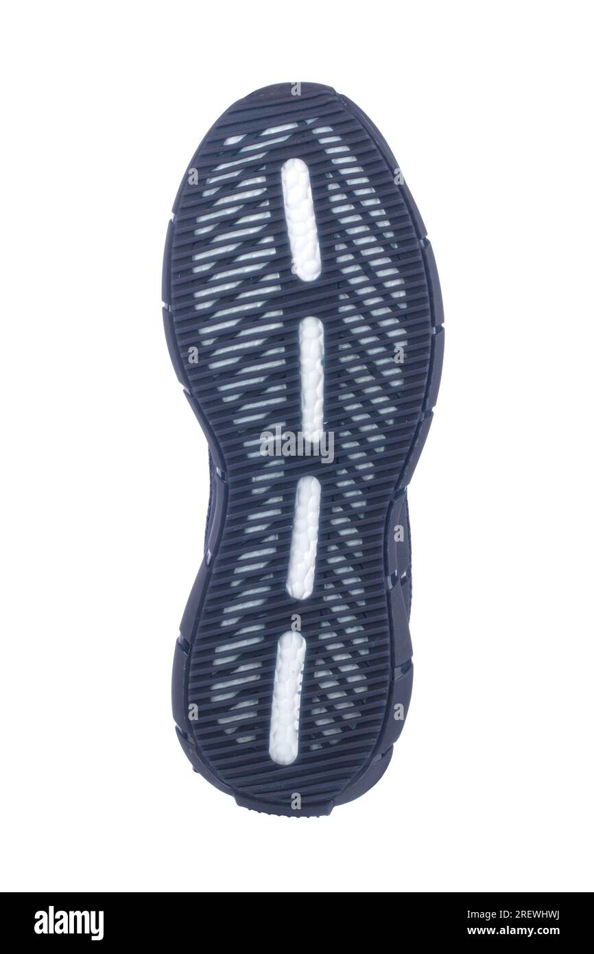 Black polypropylene shoe sole with white stripes isolated on white background. Stock Photo
