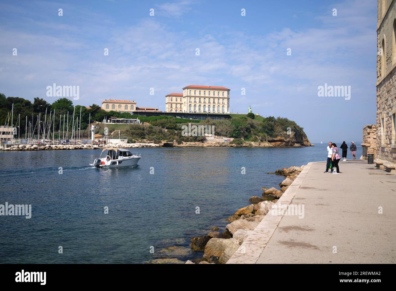 Small boat leaving the Old Port of Marseille France Stock Photo