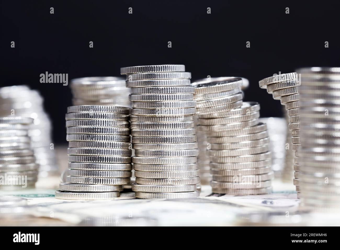coins with a silvery hue and made of metal alloys, close up of coins is