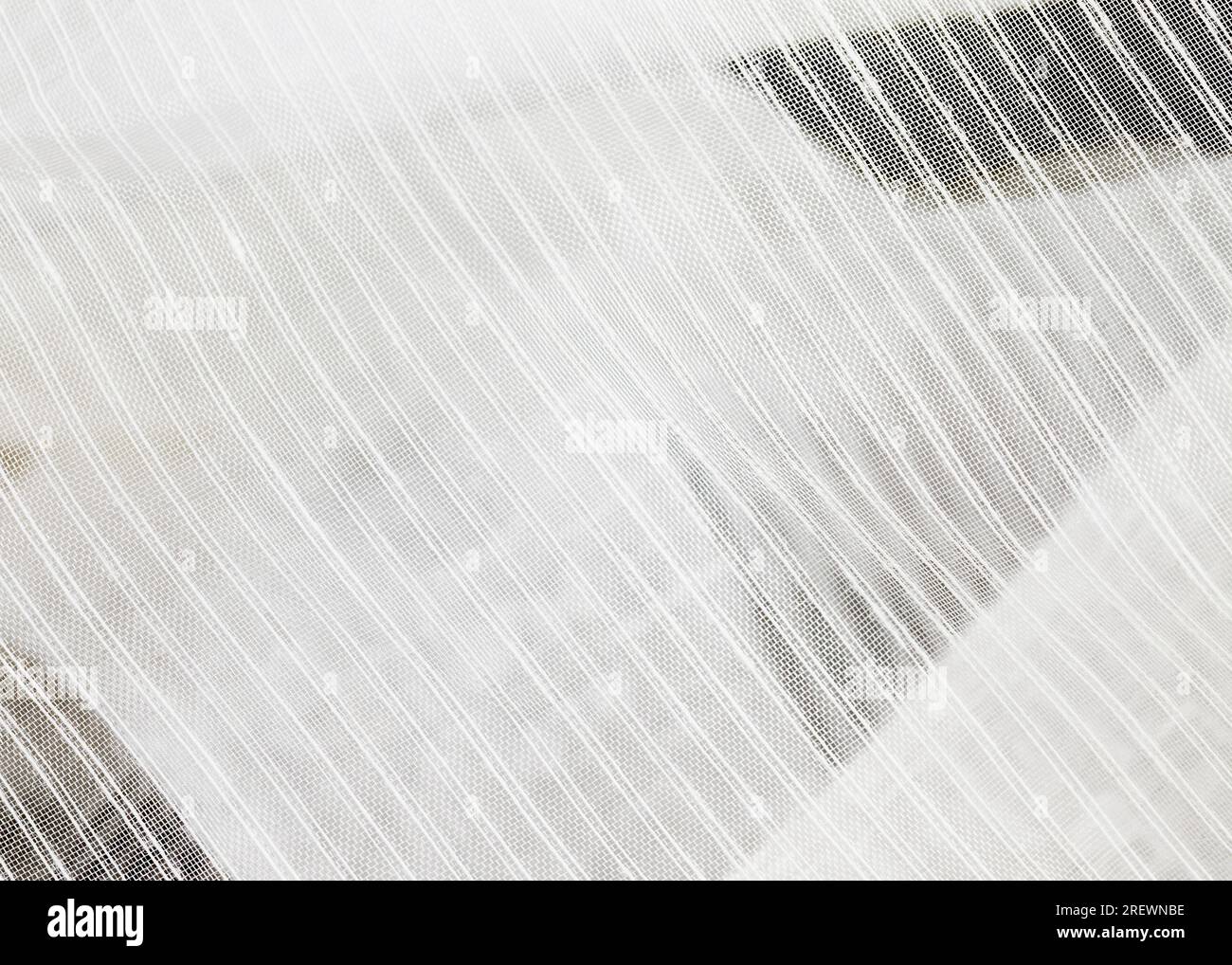 white synthetic surface of the material that is used for decoration as  tulle, close up of transparent mesh tulle material Stock Photo - Alamy