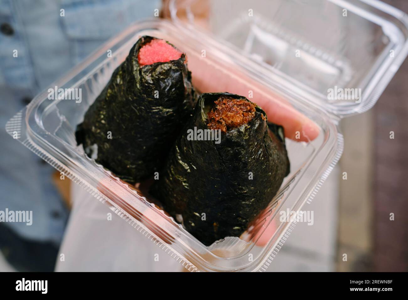 June 2023. Rice ball covered in nori seaweed (musubi Stock Photo Alamy