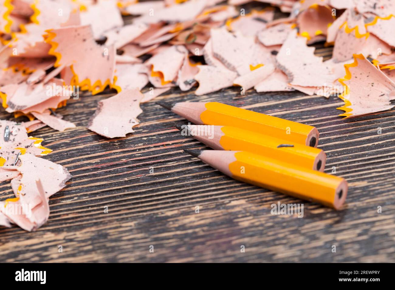 pencil shavings after sharpening, wood debris, and parts of gray