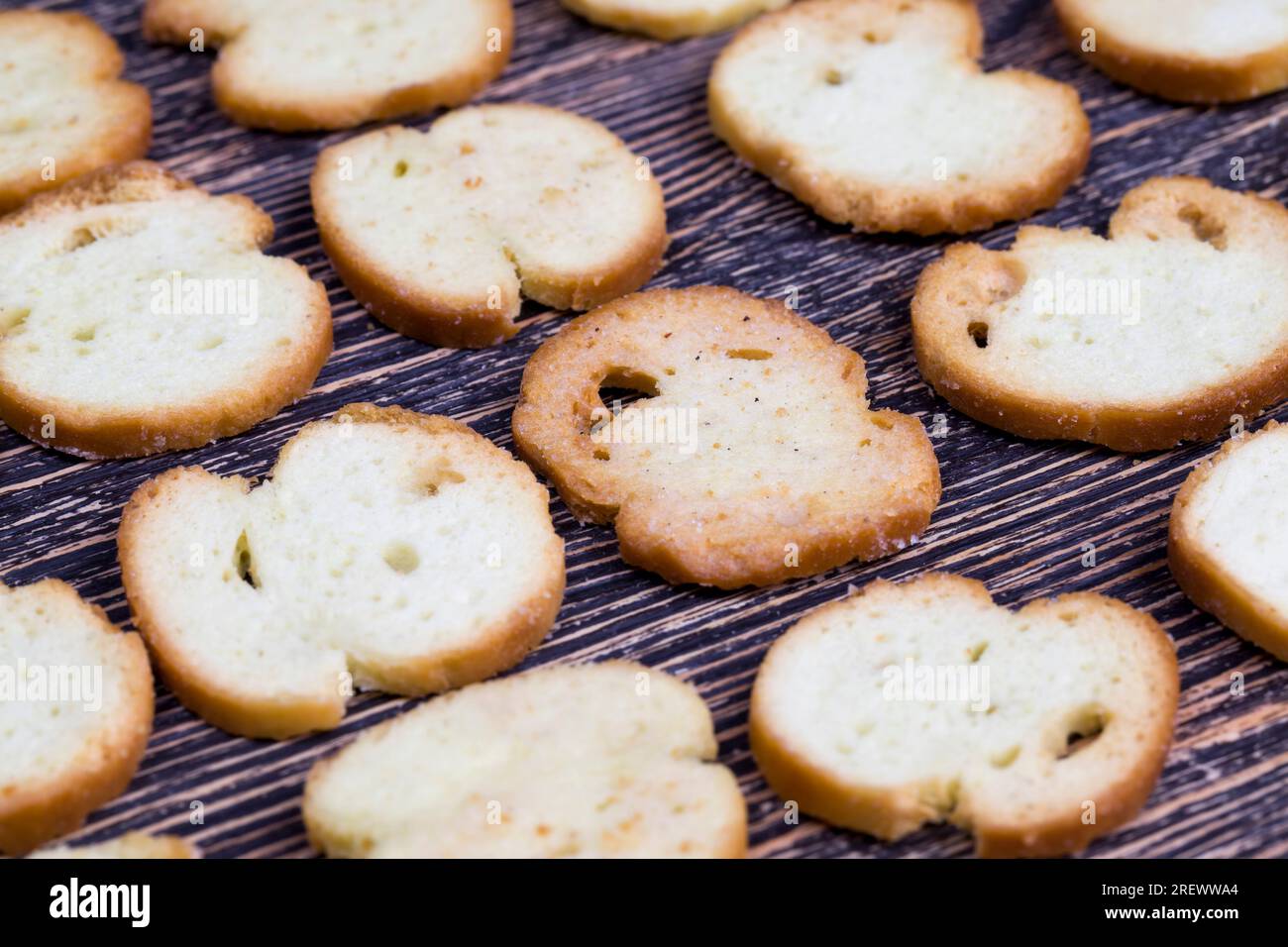Fied Ritz Crackers fried rye crackers with spices , close up of food made from wheat flour ...