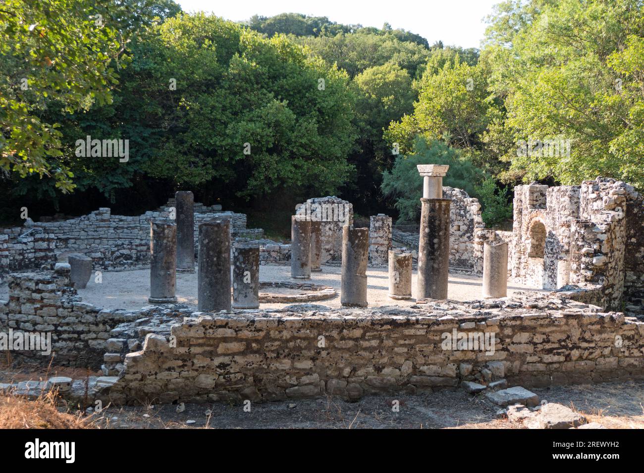 View of the archeological site of Butrint in Albania, an ancient Greek polis and Roman city: remains of the baptistery. UNESCO World Heritage Site and Stock Photo