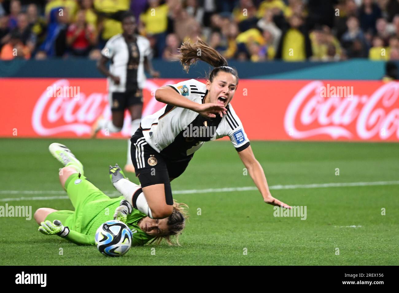 Sydney, Australia. 30th July, 2023. Soccer, Women: World Cup, Germany - Colombia, Preliminary Round, Group H, Matchday 2 at Sydney Football Stadium, Germany's Lena Oberdorf is fouled by Colombia goalkeeper Catalina Pérez. Credit: Sebastian Christoph Gollnow/dpa/Alamy Live News Stock Photo
