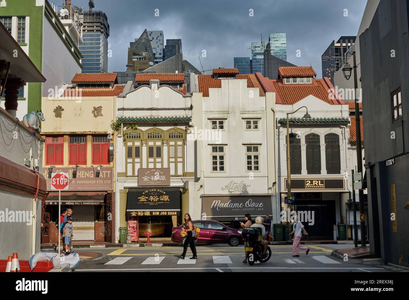 Renovated old shophouses in South Bridge Road, Chinatown, Singapore, lit by evening light and