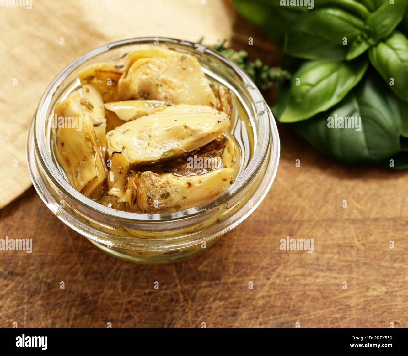 grilled artichokes in oil with spices and herbs Stock Photo Alamy