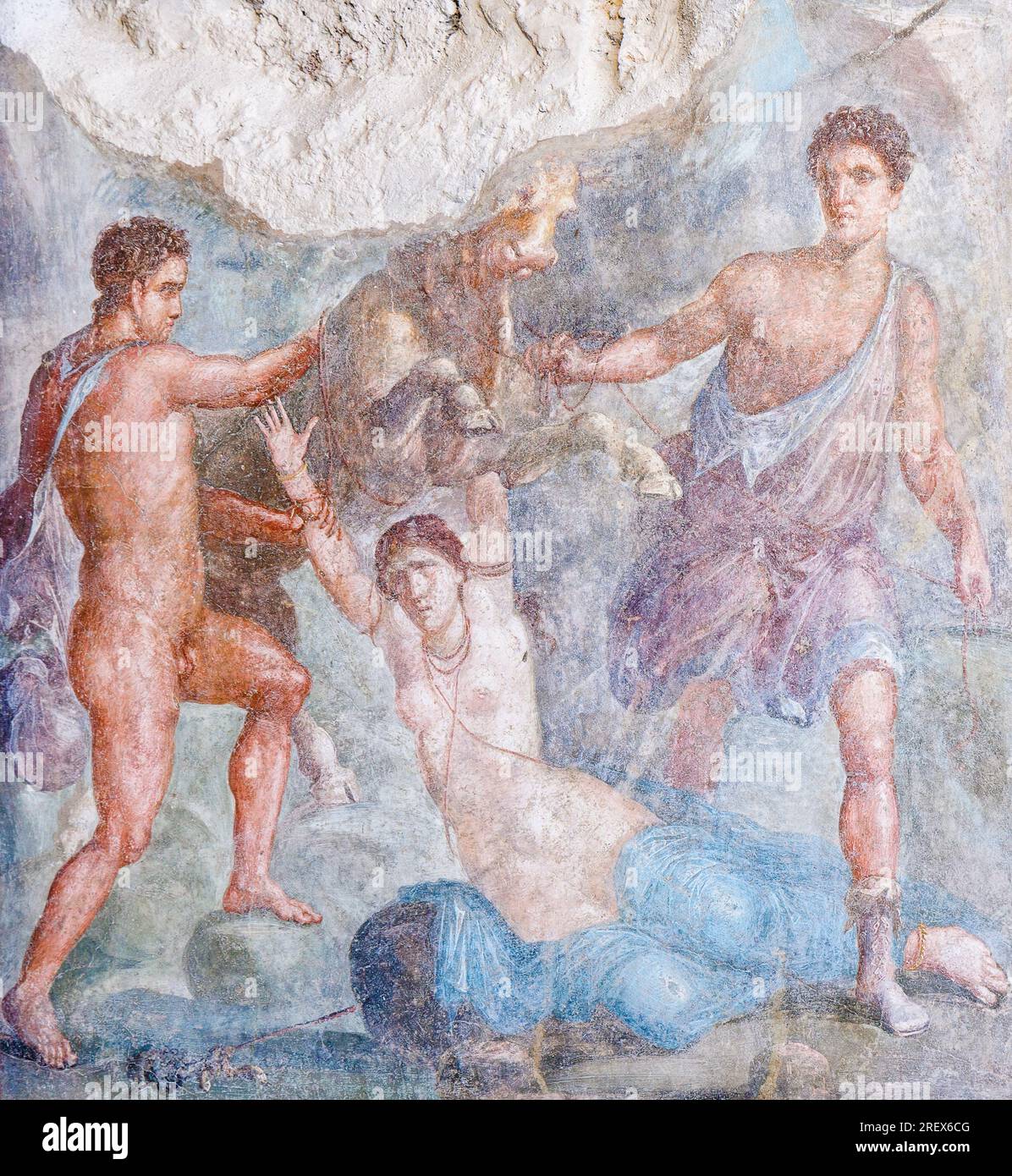 Pompeii Archaeological Site, Campania, Italy.  Fresco illustrating the punishment of Dirce from the Greek myth. House of the Vettii.  Casa dei Vettii. Stock Photo