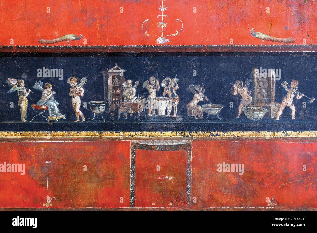 Pompeii Archaeological Site, Campania, Italy.  Cupids and Psyches preparing perfume. House of the Vettii.  Casa dei Vettii.  Pompeii, Herculaneum, and Stock Photo