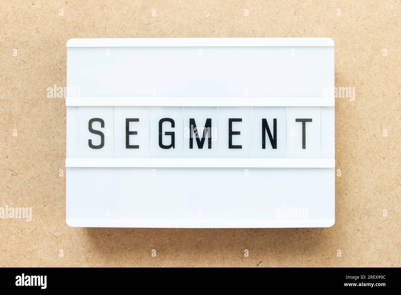 Lightbox with word segment on wood background Stock Photo