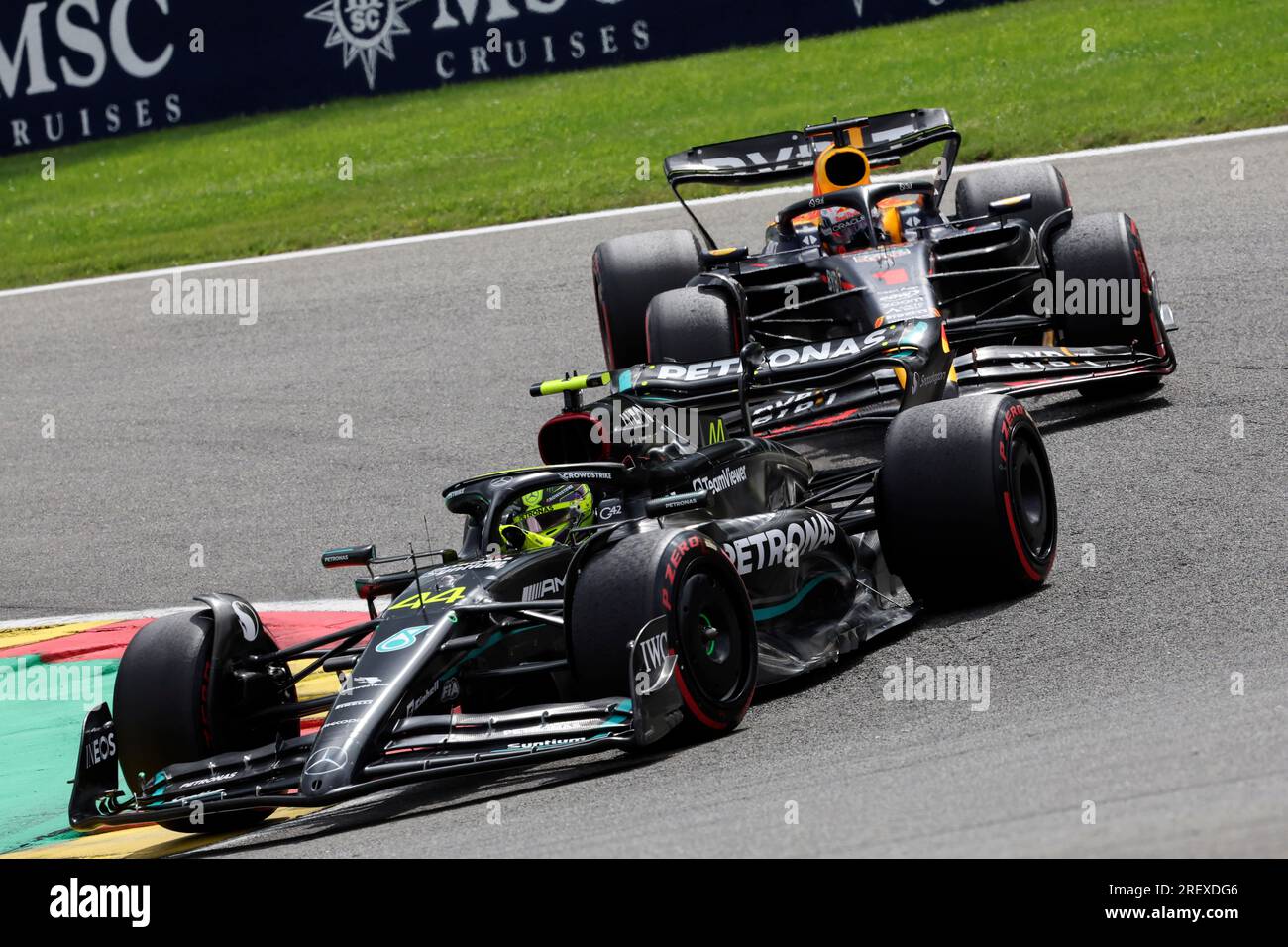 Mercedes driver Lewis Hamilton of Britain, left, and Red Bull driver Max  Verstappen of the Netherlands steer their cars during the Formula One Grand  Prix at the Spa-Francorchamps racetrack in Spa, Belgium,