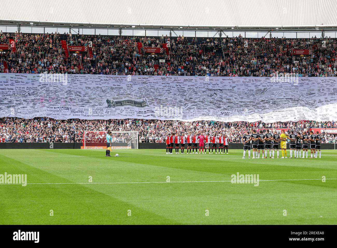 Rotterdam, Netherlands. 30th July, 2023. ROTTERDAM, NETHERLANDS - JULY 30: 1 minute sllience and the flag with all the names of old players and supporters of Feyenoord who passed away. during the Pre Season Friendly match between Feyenoord and Benfica at Stadion Feijenoord on July 30, 2023 in Rotterdam, Netherlands (Photo by Hans van der Valk/Orange Pictures) Credit: Orange Pics BV/Alamy Live News Stock Photo