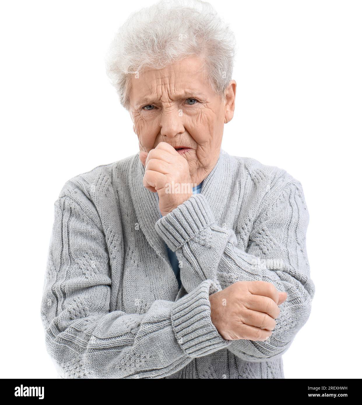 Senior woman coughing on white background Stock Photo - Alamy