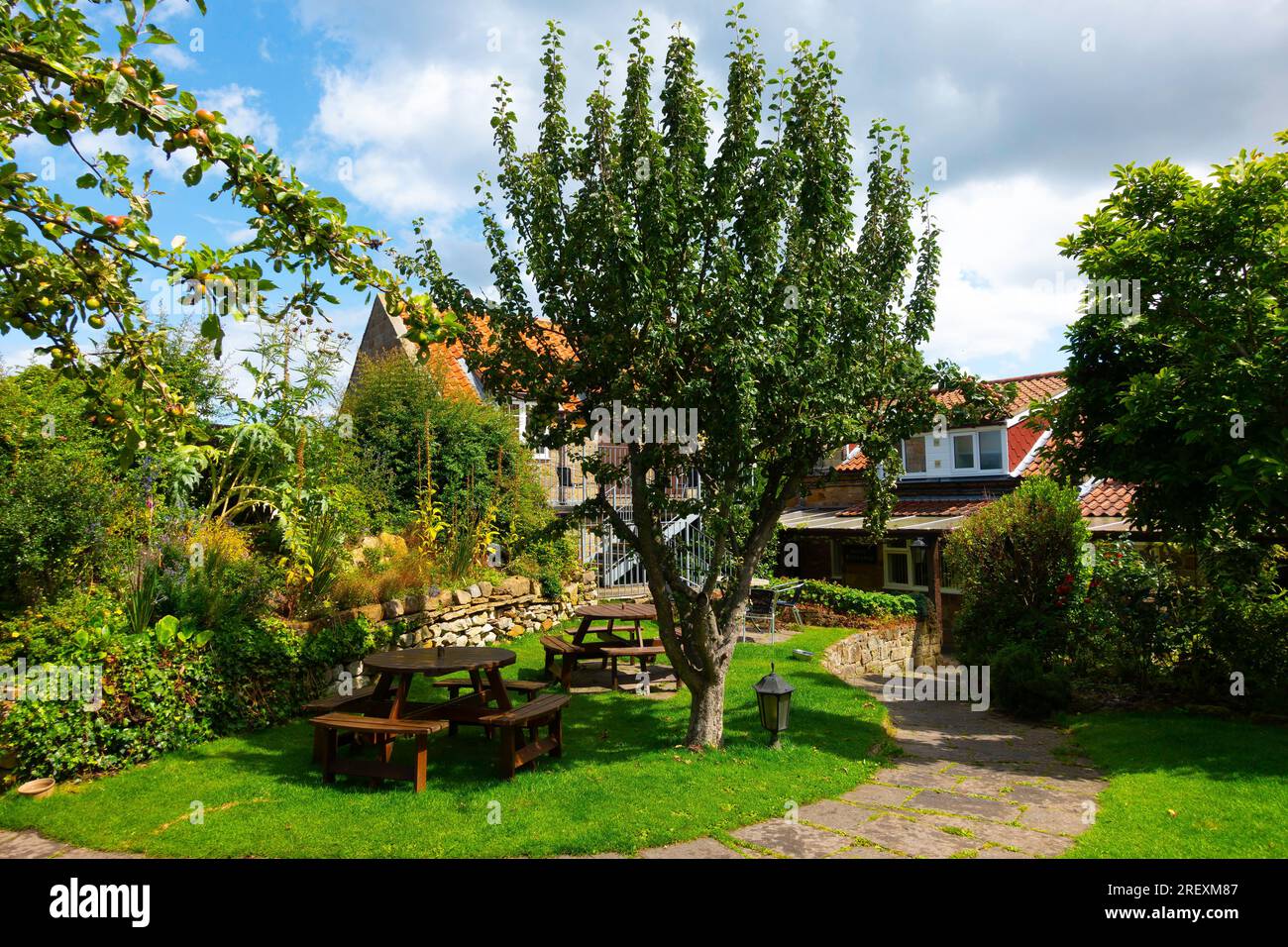 The rear entrance to the Ellerby hotel North Yorkshire with tables for eating outside Stock Photo