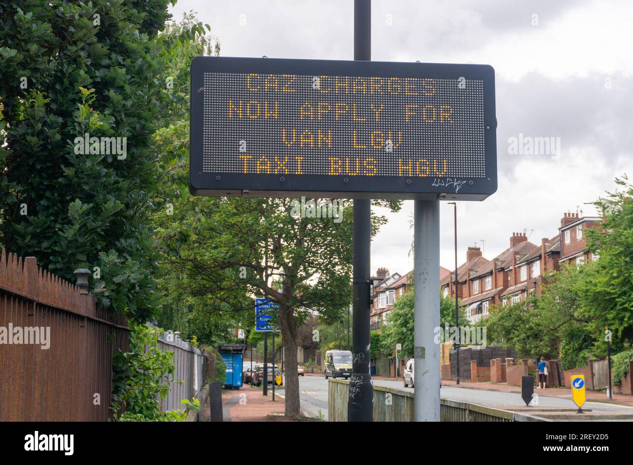 A sign warns of the Clean Air Zone or CAZ charges in the city of Newcastle upon Tyne, UK Stock Photo