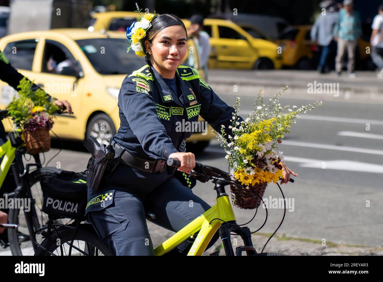 Medellin, Colombia. 29th July, 2023. A Colombian police officer rides a