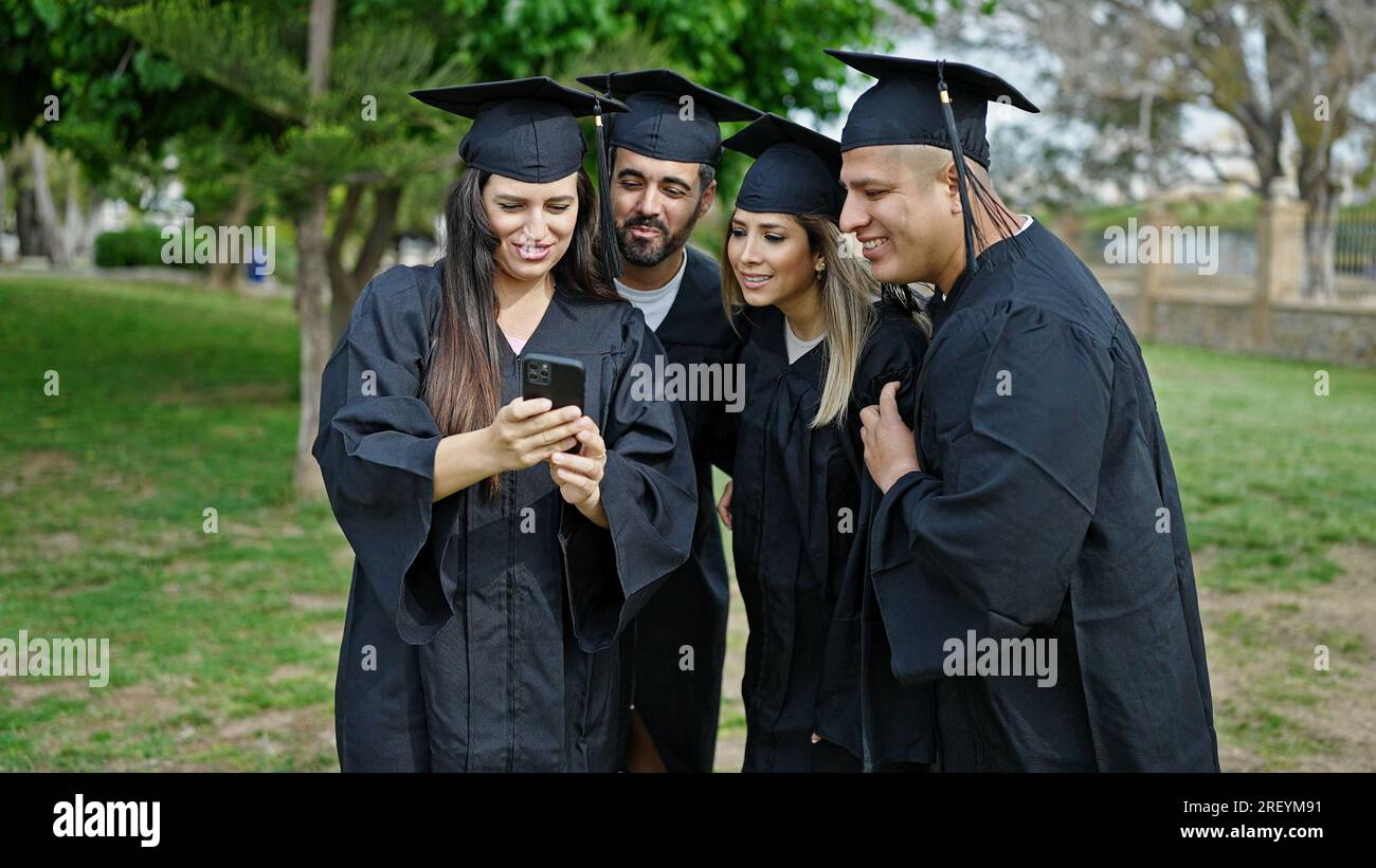 Group of people students graduated using smartphone at university ...