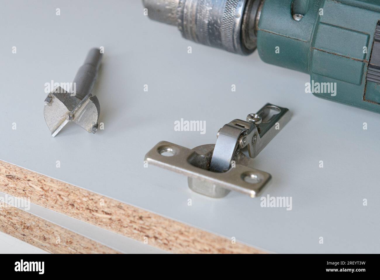 Special drill for large holes in wood. Tools for installation furniture