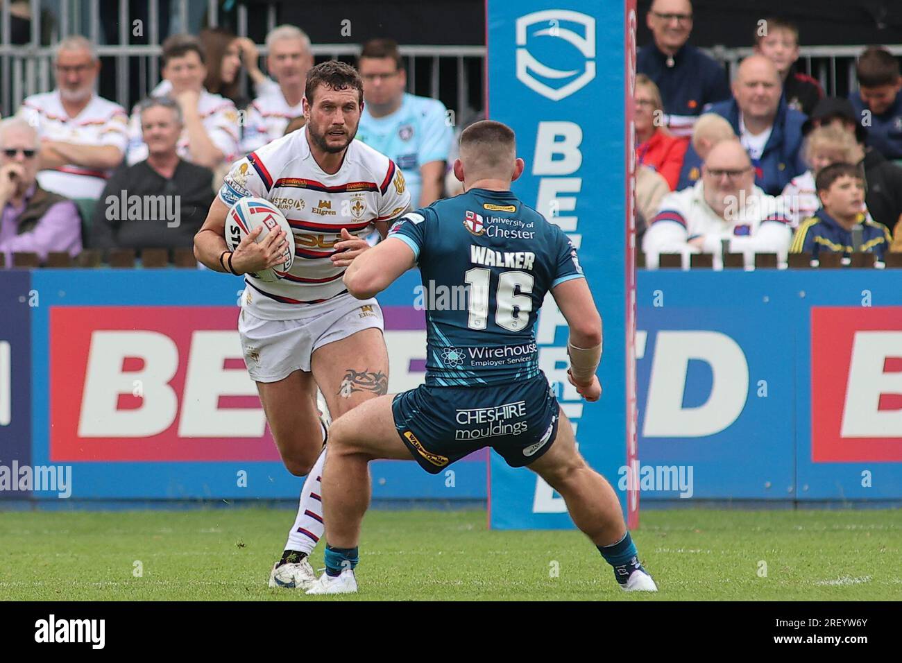 Wakefield, UK. 30th July, 2023. Be Well Support Stadium, Wakefield, West Yorkshire, 30th July 2023. Betfred Super League Wakefield Trinity vs Warrington Wolves Jay Pitts of Wakefield Trinity tackled by Danny Walker of Warrington Wolves Credit: Touchlinepics/Alamy Live News Stock Photo