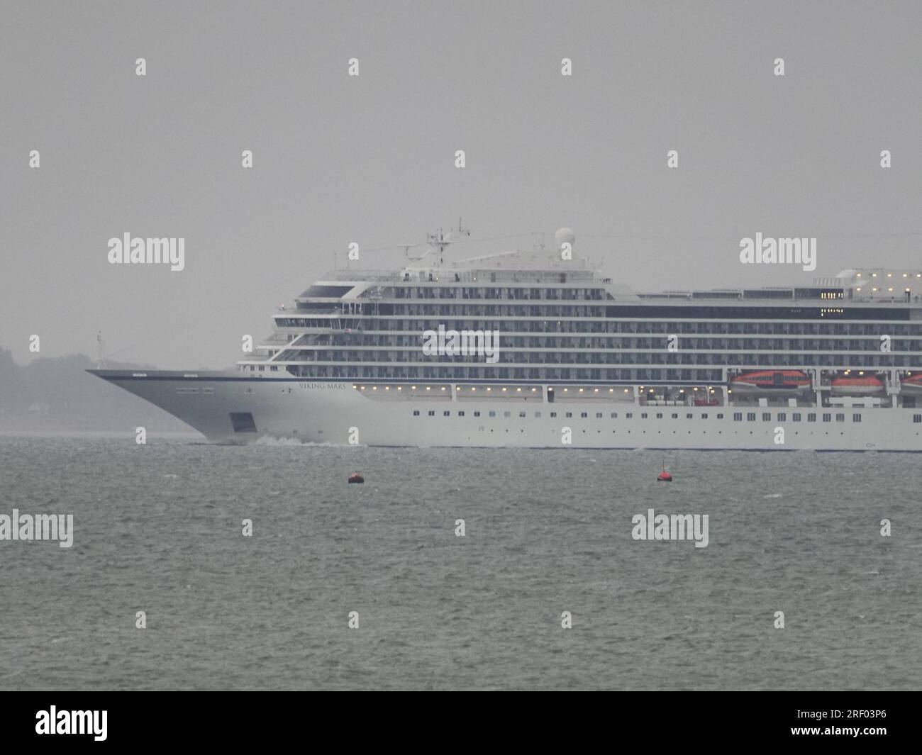 Sheerness, Kent, UK. 30th July, 2023. Viking Mars cruise ship arriving on the Thames in the rain as seen from Sheerness, Kent. Credit: James Bell/Alamy Live News Stock Photo