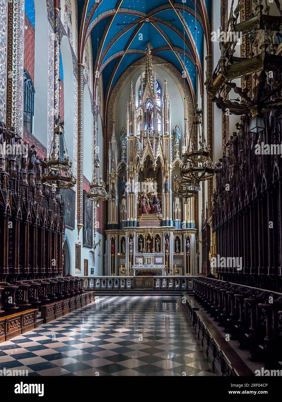 Gothic Main Altar in historical Church of Holy Trinity, Krakow Poland Stock Photo