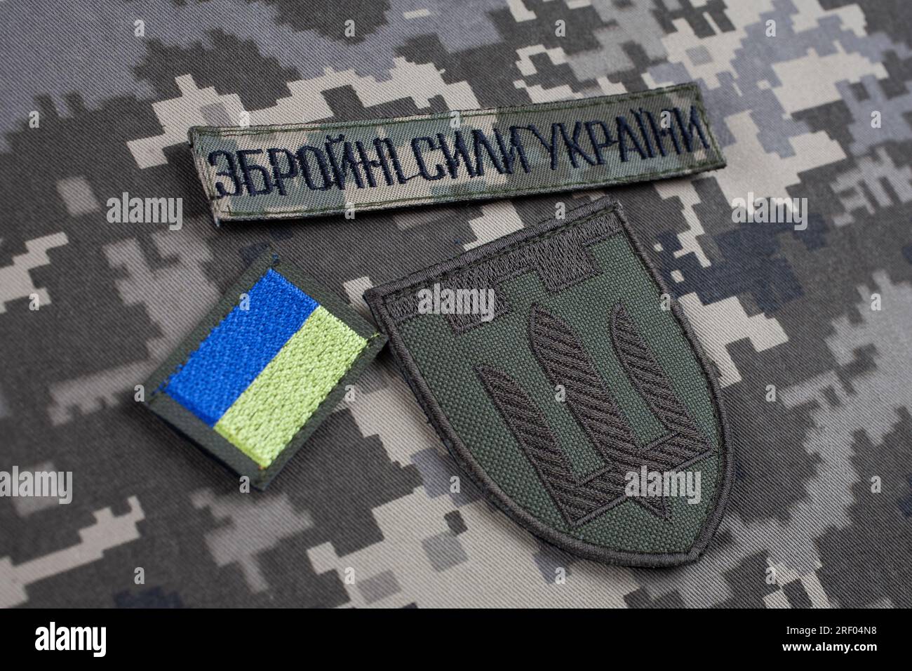 KYIV, UKRAINE - October 6, 2022. Russian invasion in Ukraine 2022. Territorial Defence Forces of Ukraine uniform insignia badge on camouflaged uniform Stock Photo