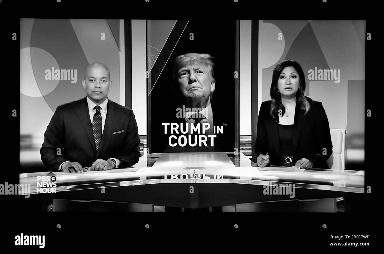 A screen shot of the The PBS NewsHour hosts, June 13, 2023, reporting former US President Donald Trump was indicted and arraigned on federal charges. Stock Photo