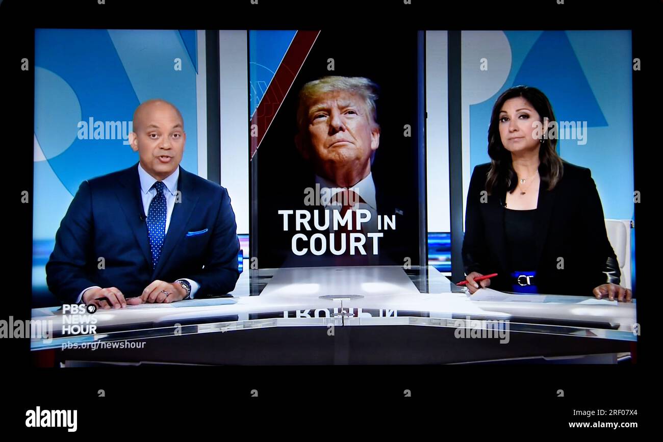 A screen shot of the The PBS NewsHour hosts, June 13, 2023, reporting former US President Donald Trump was indicted and arraigned on federal charges. Stock Photo
