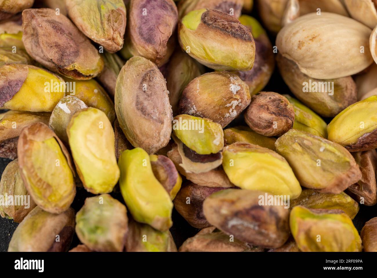 peeled fresh crunchy pistachios, green nuts pistachios without shells