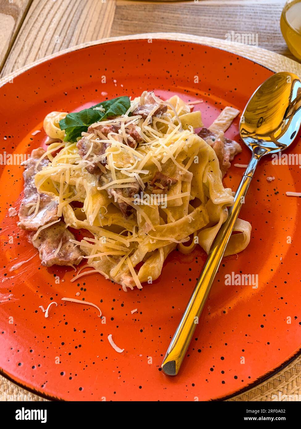 Kazakhstan, Almaty. Chicken and Pasta for Lunch. Stock Photo