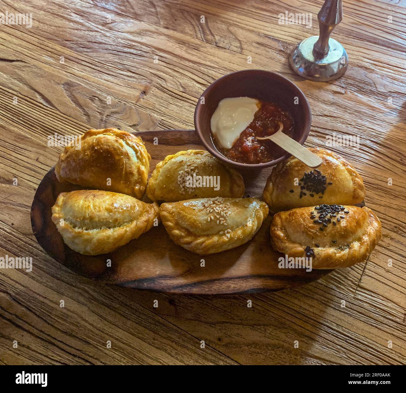 Kazakhstan, Almaty. Samsa Pastry Filled with Mushrooms, Pumpkin, or Horsemeat (left to right). Stock Photo