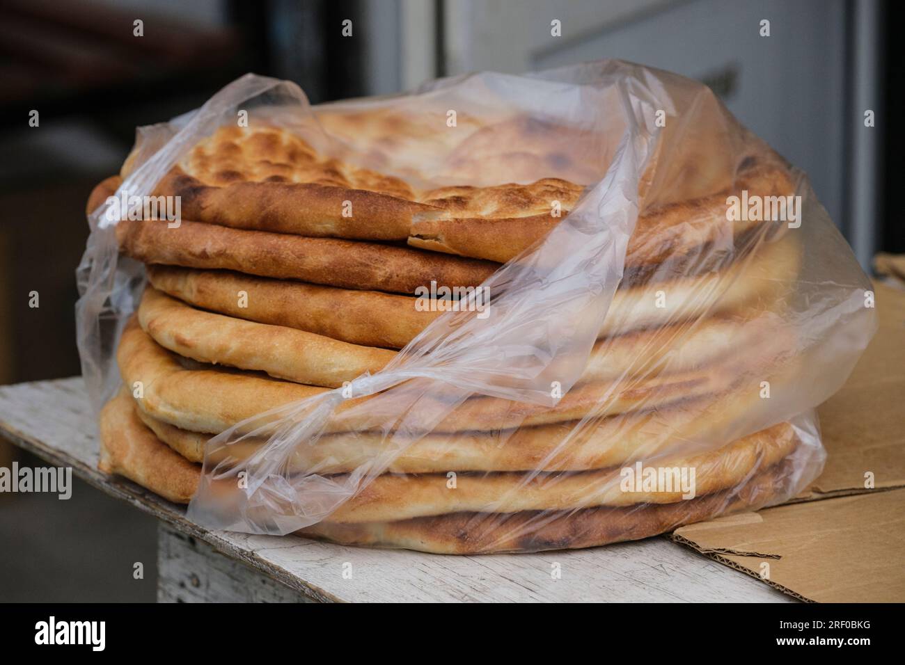 Kazakhstan, Bayseit. Flat Bread for Sale. Stock Photo
