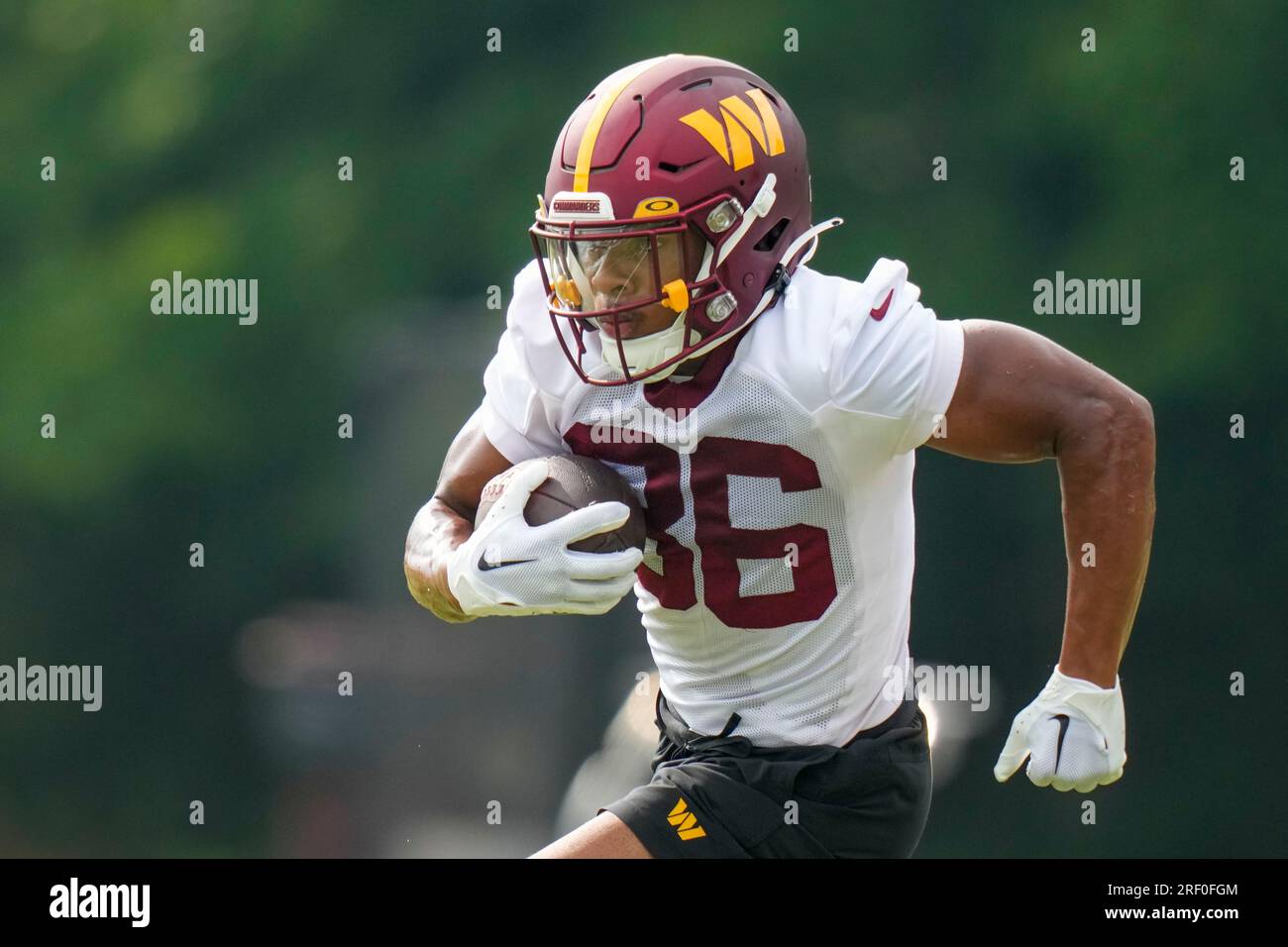 Washington Commanders wide receiver Mitchell Tinsley (86) runs during a