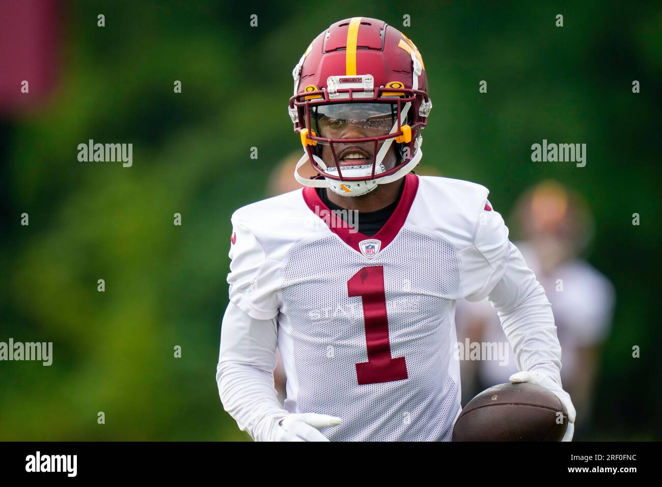 Washington Commanders wide receiver Jahan Dotson (1) runs with the ball
