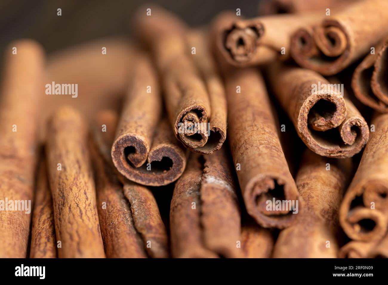 Whole dried cinnamon for baking, heaped fragrant cinnamon spice Stock