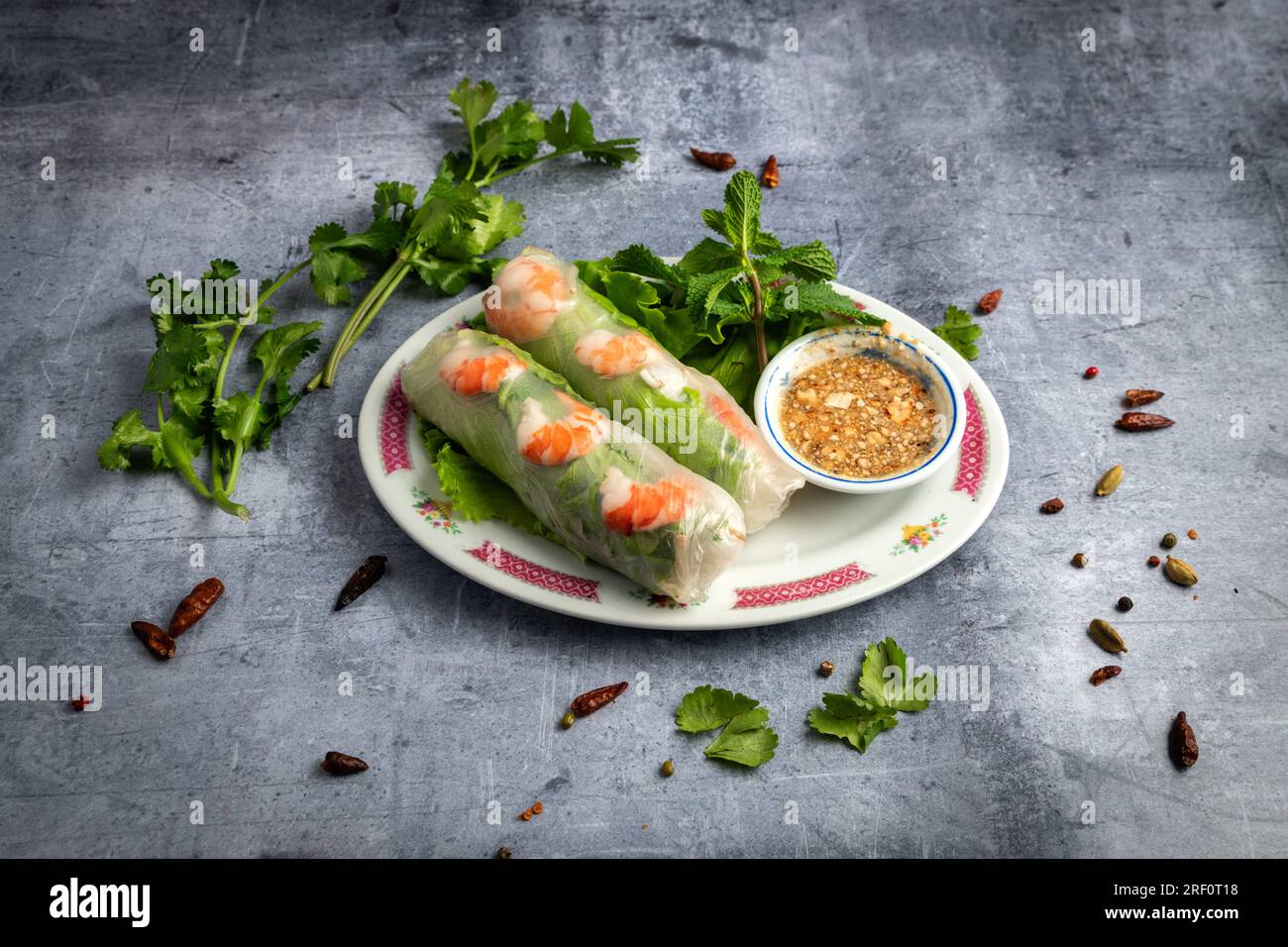 extra-fresh spring rolls cooked with shrimps, sauce and mint Stock Photo