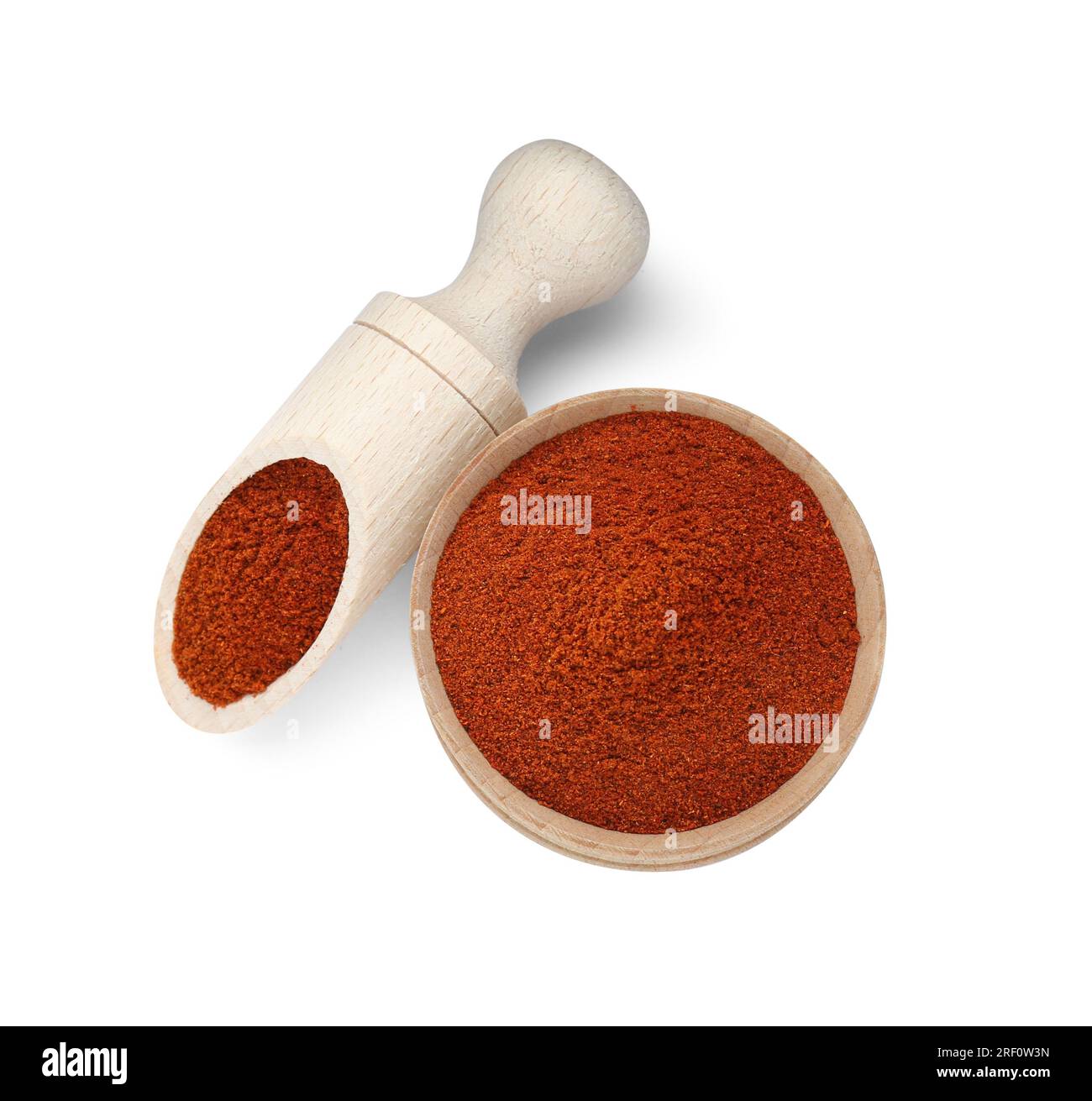Scoop and bowl with aromatic paprika isolated on white, top view Stock