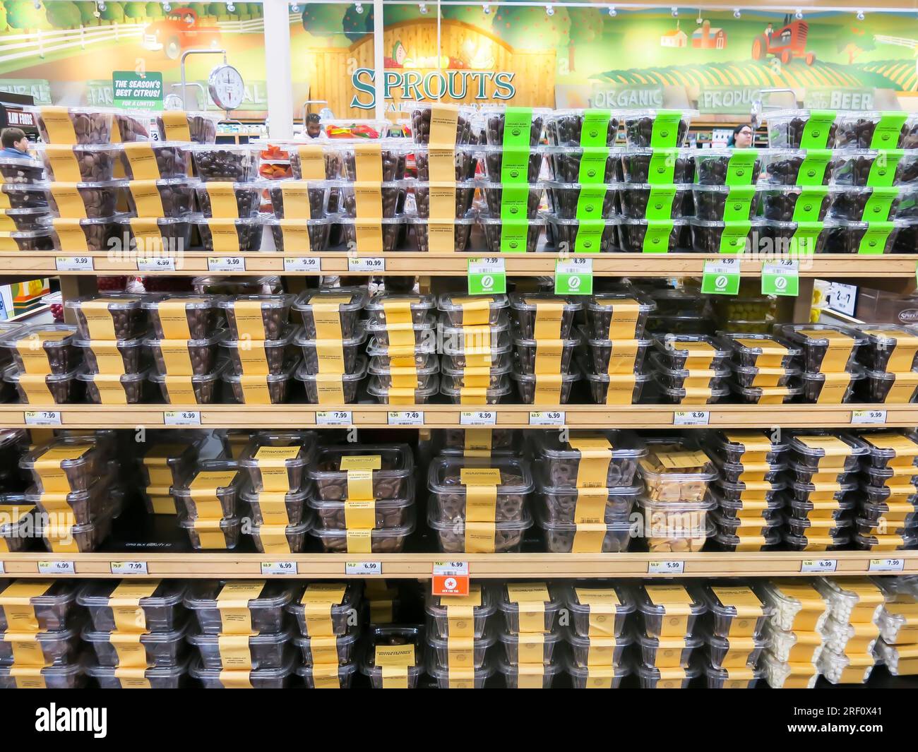 Pre-packaged Food Items on Display in Supermarket Stock Photo