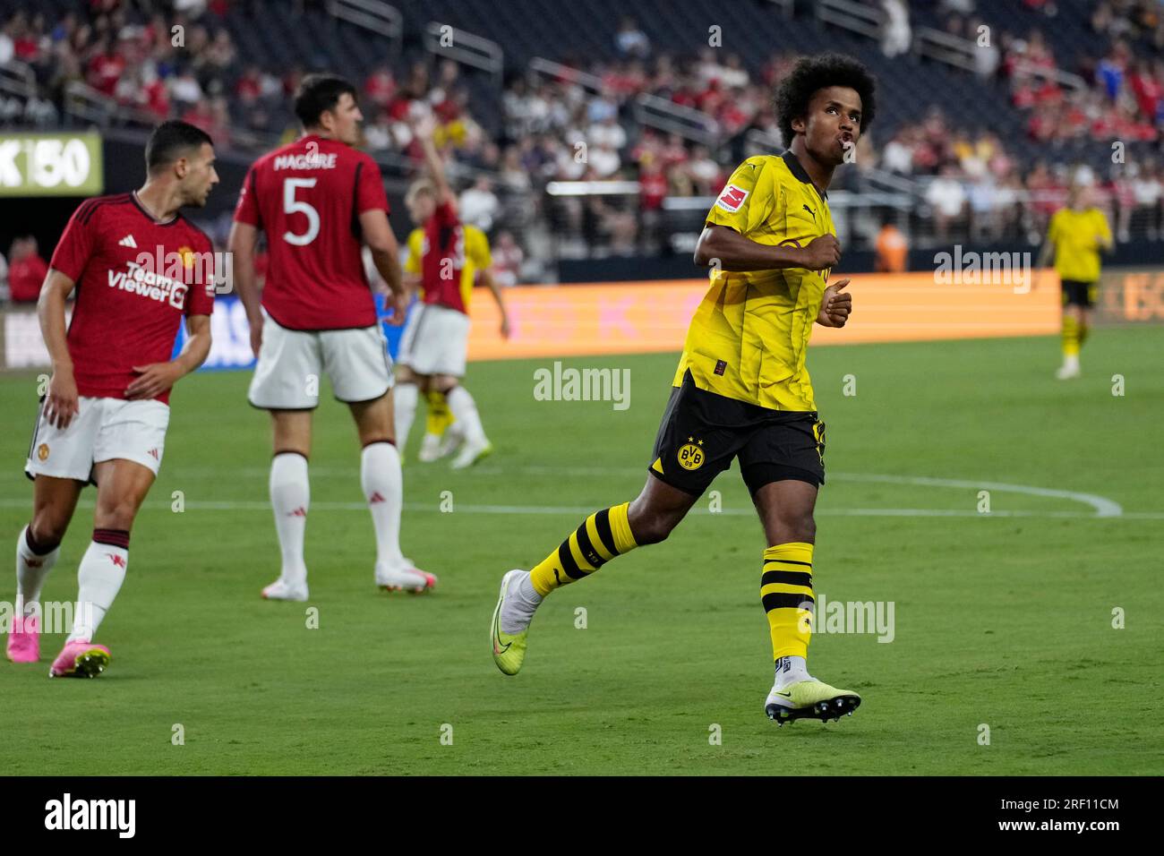 Adeyemi Running Borussia Dortmund's Karim Adeyemi reacts after a missed goal attempt ...