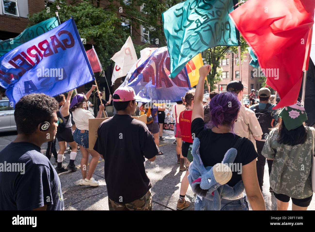 Seattle, USA. 30 Jul, 2023. Anti APEC protestors take over Pine Street ...