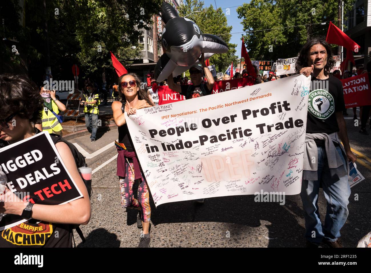 Seattle, USA. 30 Jul, 2023. Anti APEC protestors take over Pine Street ...