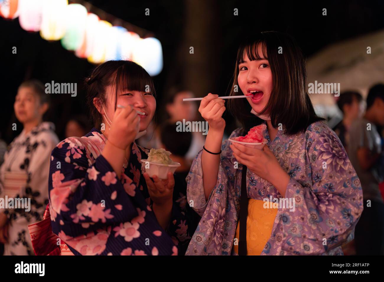 yokohama-japan-29th-july-2023-girls-dressed-in-yukata-eat-kakigori