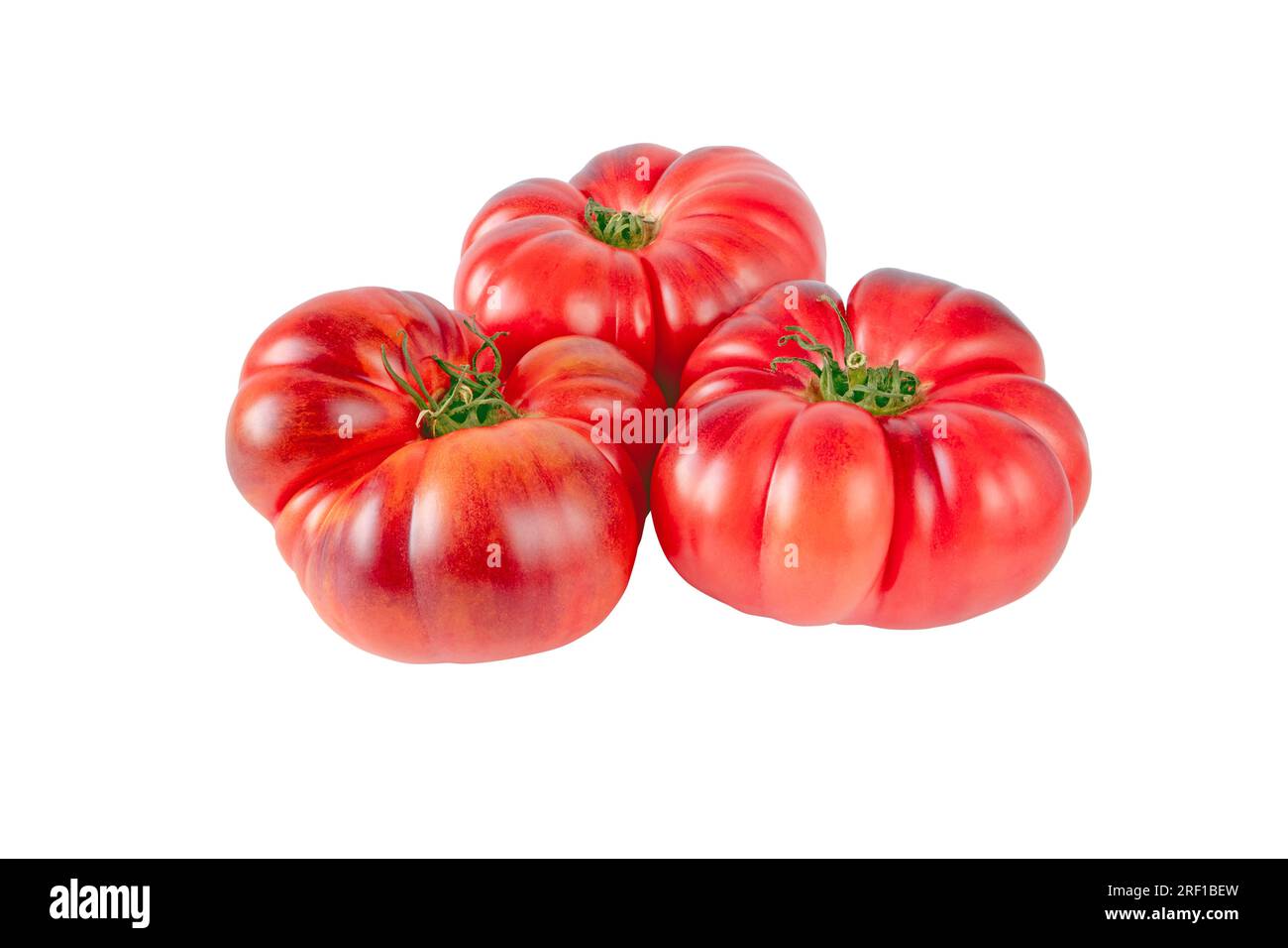 Purple tomato vegetables isolated on white background. Solanum lycopersicum ripe fruit. Stock Photo