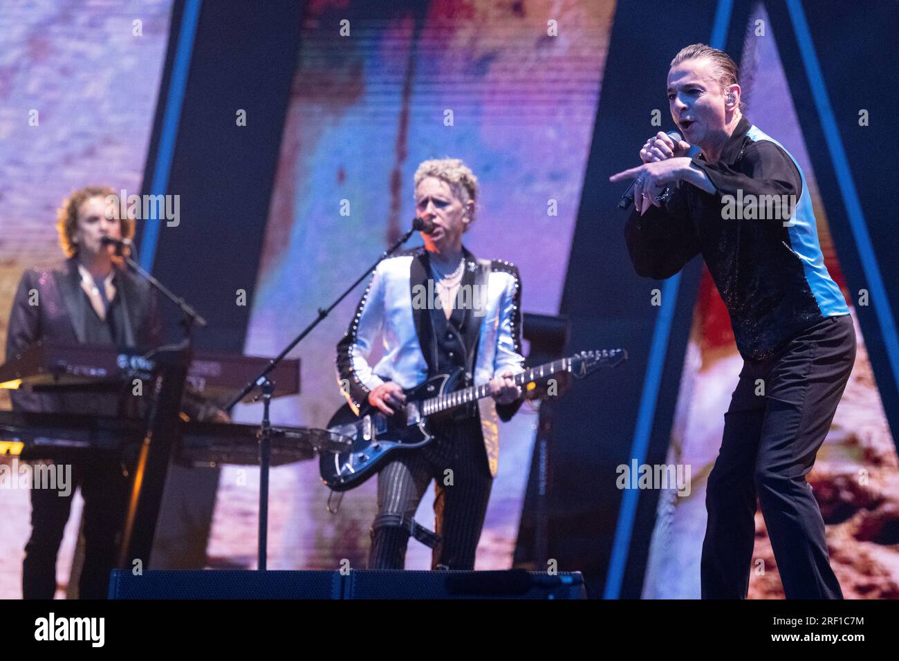 Prague, Czech Republic. 30th July, 2023. Guitarist Martin Gore, center, and singer Dave Gahan, right, of British music band Depeche Mode perform during the Memento Mori World Tour, on July 30, 2023, in Prague, Czech Republic. Credit: Michal Kamaryt/CTK Photo/Alamy Live News Stock Photo