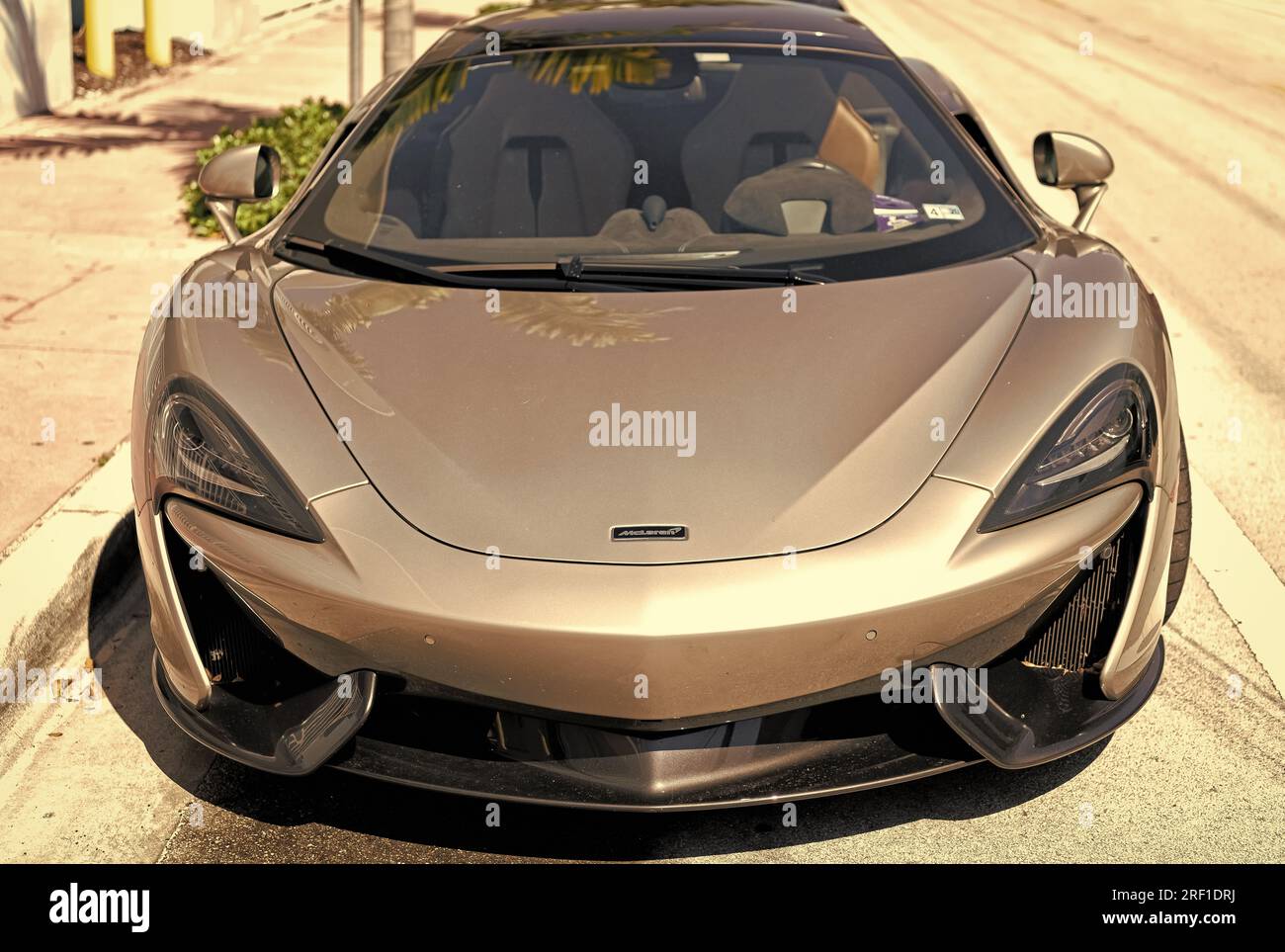 Los Angeles, California USA - April 13, 2021: silver grey McLaren Automotive Limited 570s luxury sport car supercar parked in LA the U.S. state of Cal Stock Photo