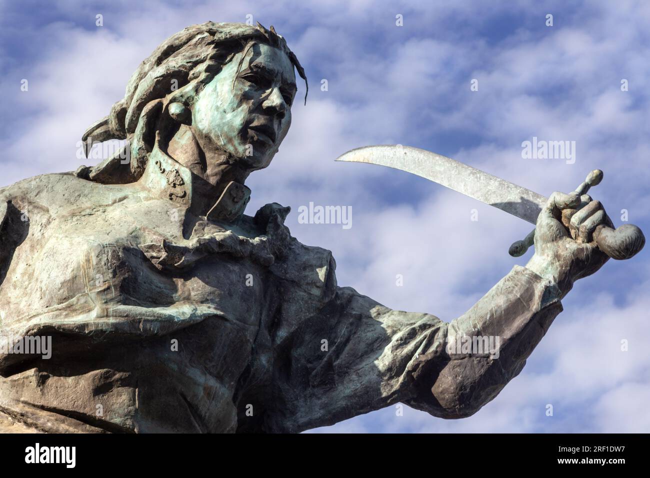 Juana Azarduy Guerilla Military Leader Holding Sword Monument, Blue Sky Background.  Art Statue at Kirchner Cultural Center Buenos Aires Argentina Stock Photo