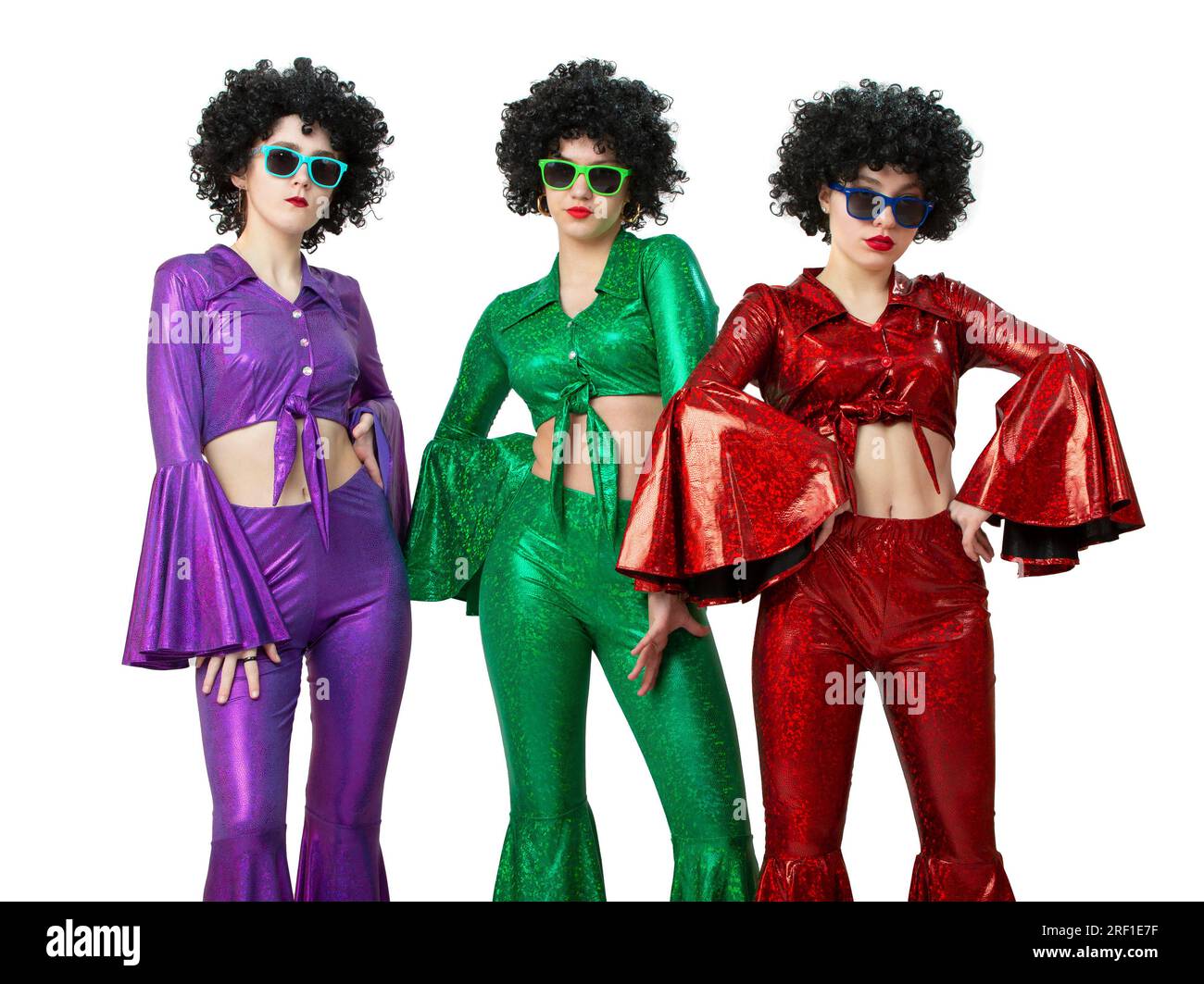 A group of disco girls in African American wigs and colorful costumes on a  white background. Fashion of the seventies and eighties Stock Photo - Alamy